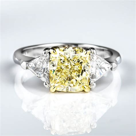 Natural fancy light yellow cushion cut diamond with vs2 clarity. Cushion 3 Stone Fancy Light Yellow Diamond Engagement Ring ...