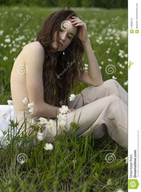 Beautiful Stylish Topless Model Girl Wearing Beige Bloomers Stock Photo