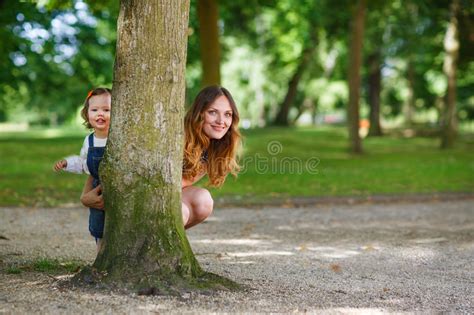 Beautiful Mother And Little Daughter Walking In Summer Park Stock Image Image Of Adorable