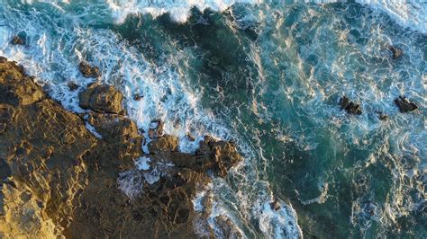Download Wallpaper 2560x1440 Rocks Aerial View Sea Foam Stones