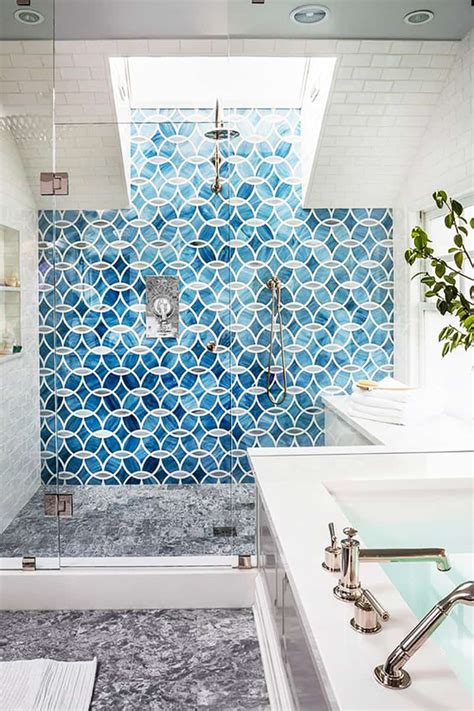 Popular bathroom tile materials—ceramic, porcelain (a subset of ceramic tile), natural stone (marble, travertine, slate, granite, or limestone), and quarry tile—are sold in a number of solid colors or patterns. Shower Tile Designs for Each and Every Taste