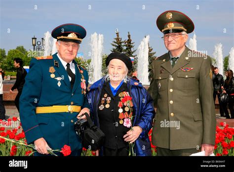 Female Soviet Veteran With 2 Colonels Celebrating World War Ii Victory