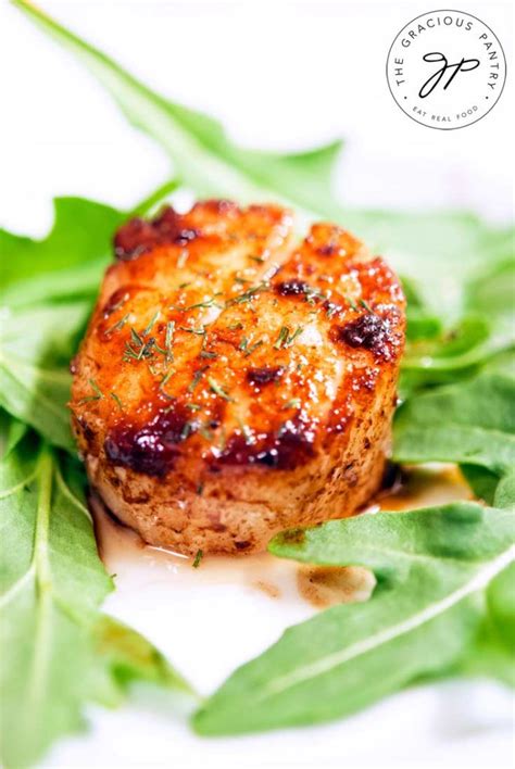 Bacon wrapped scallops work as a stunning appetizer or a main dish. Simple Sea Scallops Recipe | The Gracious Pantry