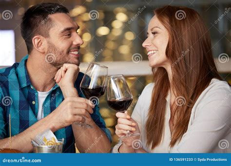 Happy Couple Drinking Red Wine At Restaurant Stock Image Image Of Date Drink 136591233