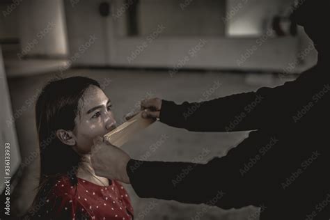 Stockfoto Asian Hostage Woman Bound With Rope At Night Scenethe