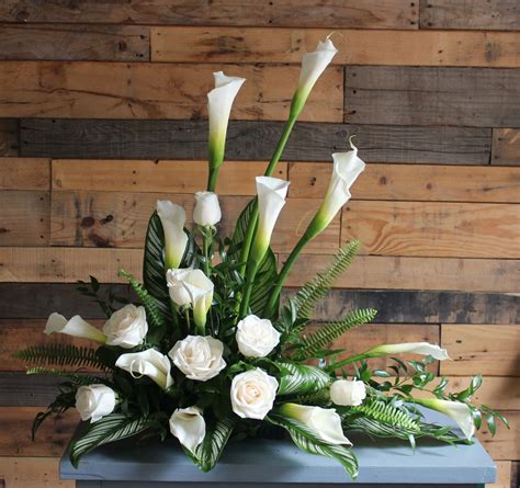 The calla lily is a flower both cut and used in bouquets and given as a living potted plant gift. Sympathy Calla Lilies and Roses in Temple City, CA | Fanny ...