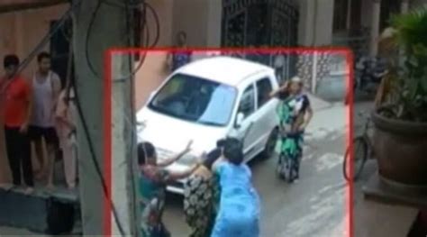 Video Cctv Captures Women Hitting Stoning Each Other Over Dog Poop In