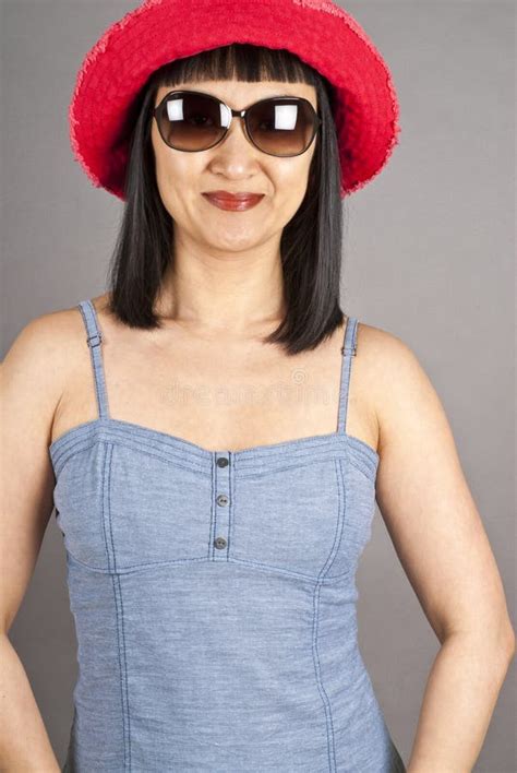 Asian Woman Wearing Sunglasses And Red Hat Stock Image Image Of Pretty Woman 19659823
