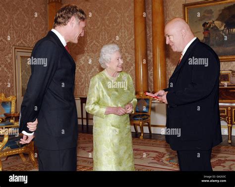 Britains Queen Elizabeth Ii Presents The Queens Gold Medal For Poetry To James Fenton Right