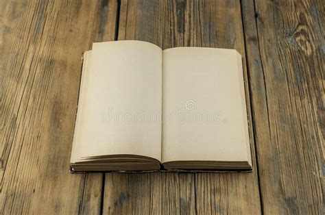 Blank Open Old Book And Key On An Old Wooden Table Stock Photo Image