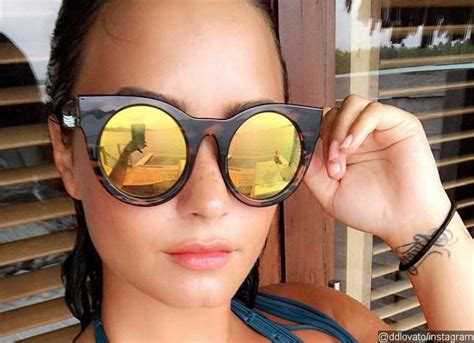 Ready For Summer Demi Lovato Flaunts Major Cleavage In Plunging Swimsuit