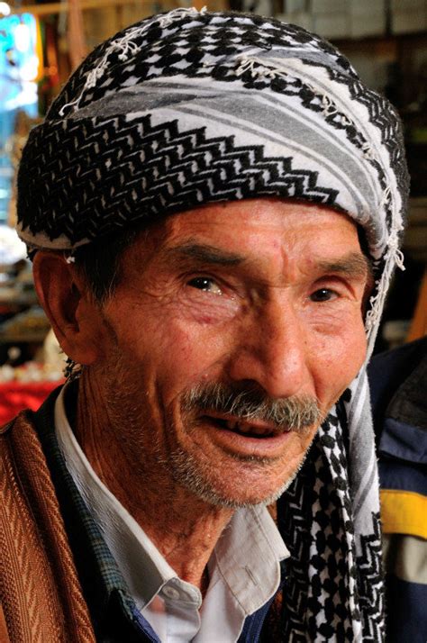 old man in the qaysari bazaar erbil kurdish region iraq photo