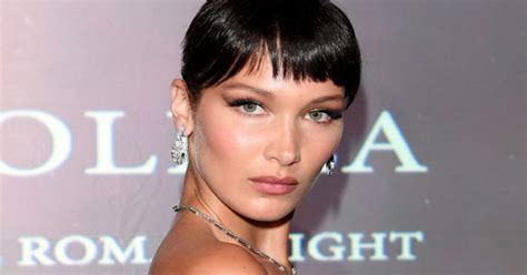 bella hadid teases crotch flash in very high slit dress daily star