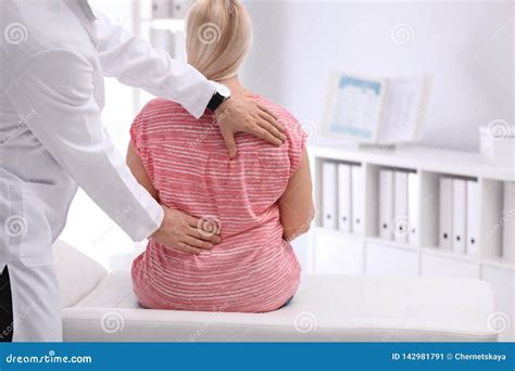 Chiropractor Examining Patient With Back Pain Stock Image Image Of