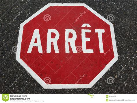 French Quebec Stop Sign Painted On Asphalt Stock Image Image Of Arret