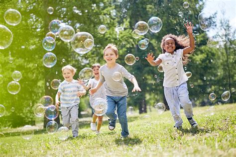Little Kids Having Fun Outdoors Stock Photos Motion Array