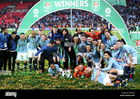 Manchester City Players And Staff Celebrate Winning The Carabao Cup