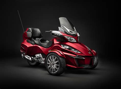 The vehicle has a single rear drive wheel and two wheels in front for steering, similar in layout to a modern snowmobile. 2015 Can-Am Spyder RT Limited Review