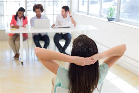 Businesswoman Relaxes Hands Behind Her Head Stock Photos Free