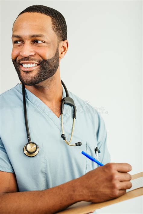 Smiling Doctor Or Male Nurse Portrait Stock Photo Image Of Check