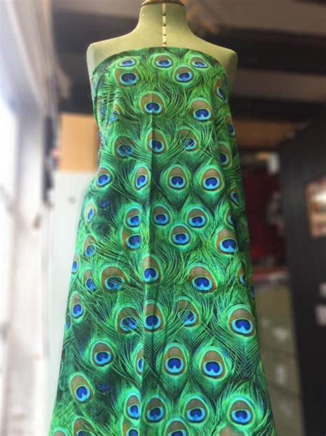 8319 stone fabrics love this jersey peacock print peacock print strapless dress dresses