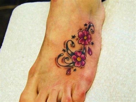 25 Flower Tattoos On Foot You Should Look At Slodive Foot Tattoos