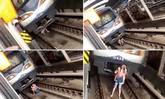 Pregnant Woman Falls Onto Chinese Subway Track But Survives Daily Mail Online