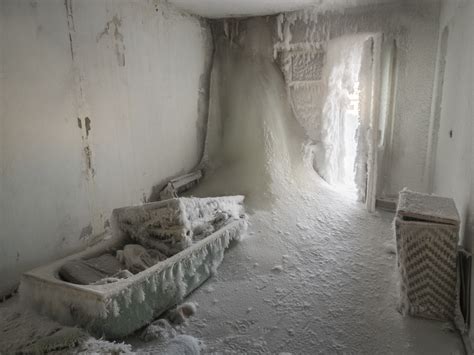 Eerie Photos Show Frozen Homes And Buildings In A Russian Ghost Town