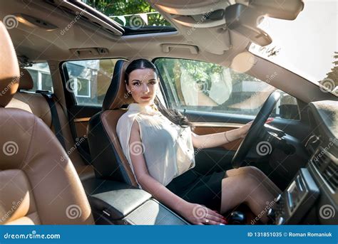 woman posing inside car sitting in driver seat stock image image of beauty automobile 131851035