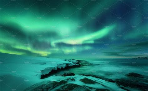 Aurora Borealis Over Ocean Aurora Borealis Aurora Winter Landscape