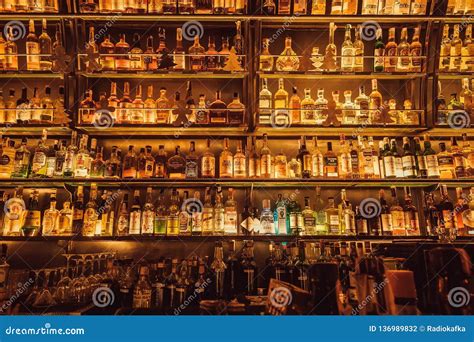 Huge Wall Of Bar With Whisky Bottles Rum Gin Vodka For Dtrong Drink