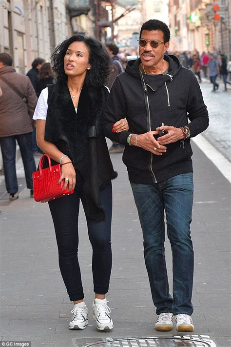 Lionel Richie 66 And His Much Younger Girlfriend Lisa Parigi Stroll Arm In Arm Through The