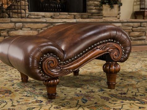 Available in vintage black, camel, vanilla and peacock leather with an antique brass frame. Cognac Brown Top Grain Leather Traditional Chair & Ottoman