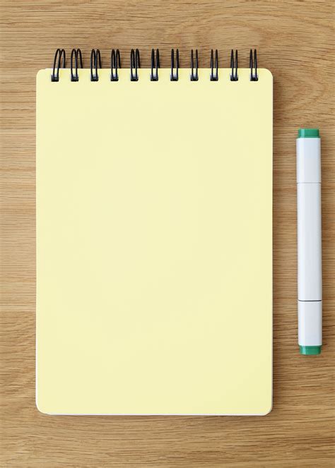 Blank Plain Yellow Notebook Page With A Pen Free Stock Photo High