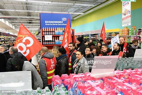 Employees Of The Carrefour France Group Assisted By A Belgian News