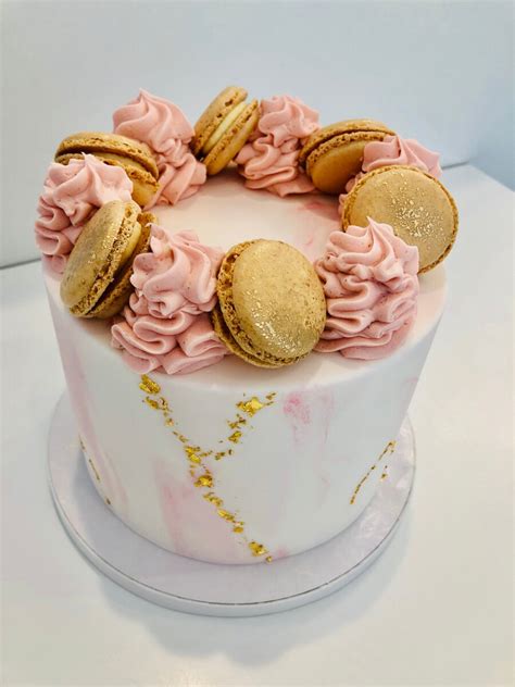 Vanilla Bake Shop Pink And Gold Marble Cake With French Macarons
