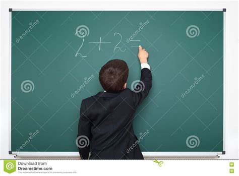 Educational background is more than a certificate. School Boy Decides Examples Math On Chalkboard Background ...