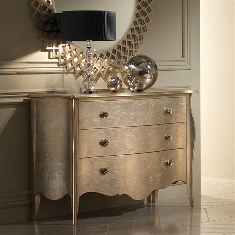 Highlighted by its high gloss white. Italian High End Champagne Leaf 3 Drawer Chest