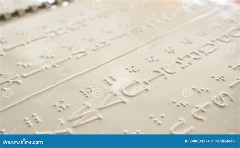 Close Up Of A Braille Decoder With The English Alphabet Stock Photo
