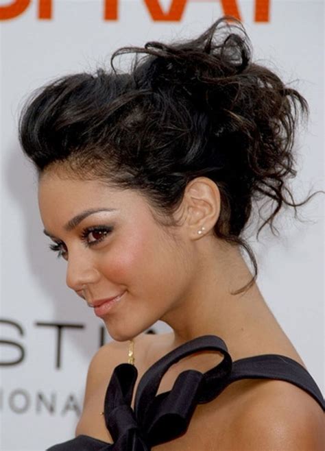 Messy high side bun with stray hair. Messy Bun Updo For Mid-Length Hair - Women Hairstyles