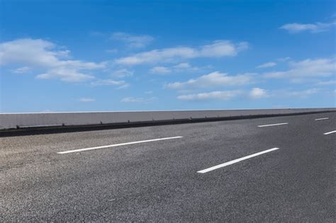 Empty Highway Asphalt Road And Beautiful Sky Landscape Premium Photo