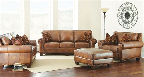 The design of this living room set is a beauty! Silverado Leather Living Room Set Steve Silver Furniture ...