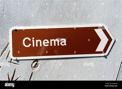 Brown Tourist Sign Cinema Arrow To The Right Stock Photo Alamy