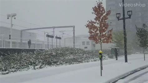 First Snowfall Of The Season Blankets Denver In White