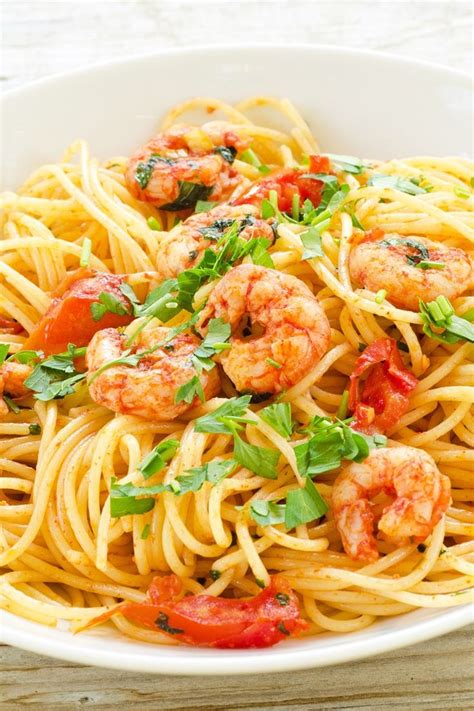Nothing says comfort more than a heaping plate of pasta in a meaty red sauce. Easy Low Fat Spicy Shrimp Pasta Recipe with Green Onion ...