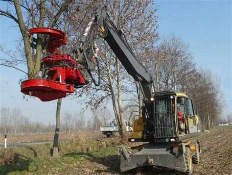 Fecon Introduces New Excavator Rotating Tree Shear Wood Business