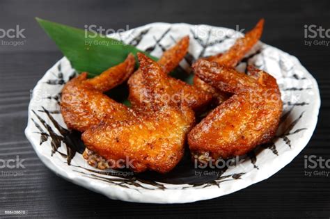 You might expect fast food wings to be small, but i guess costco doesn't do anything small. Deepfried Chicken Wings Stock Photo - Download Image Now - iStock
