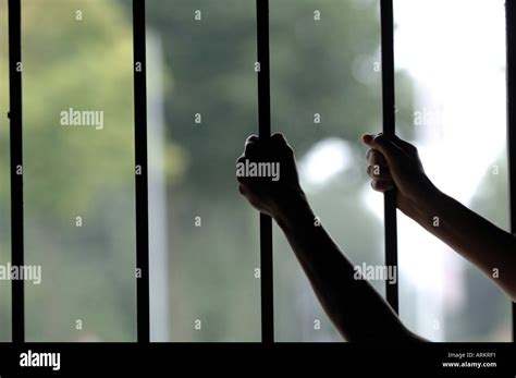 Arms Hands On Bars Incarcerated Prisoner Prison Stock Photo Alamy