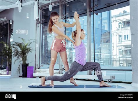 Experienced Female Master Bettering Womans Yoga Pose Stock Photo Alamy