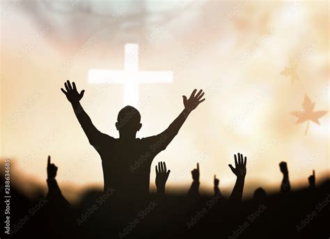 Praise And Worship Concept Silhouette Human Raising Hands To Praying